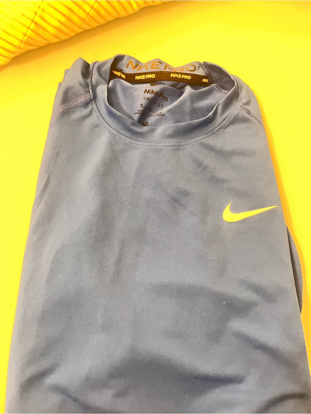 Like new Nike short Sleeve Performance Top - Navy with Yellow Swoosh size M